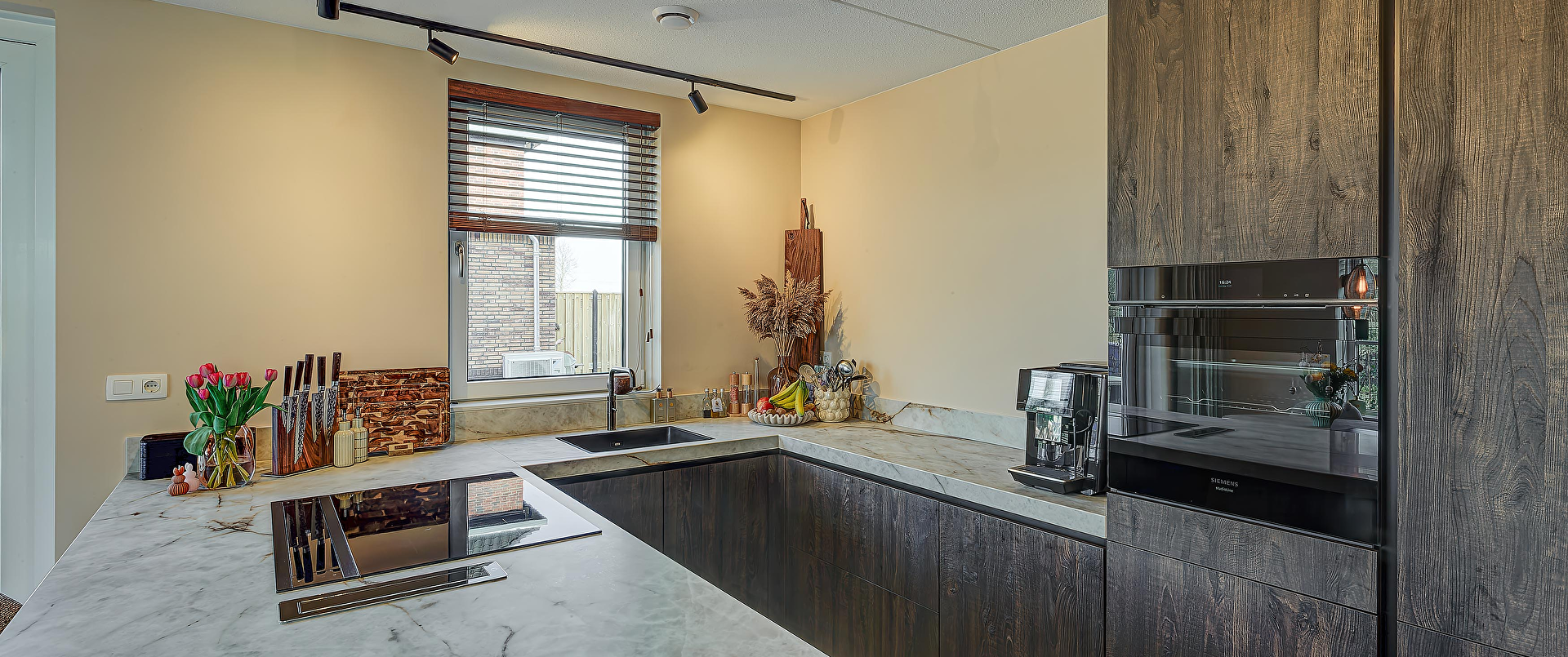 Greeploze designkeuken in Kashmir Grey met elegante keramische accenten